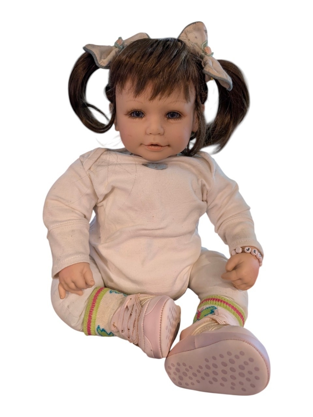 Realistic Baby Doll in Cream Outfit with Pink Shoes - Adora